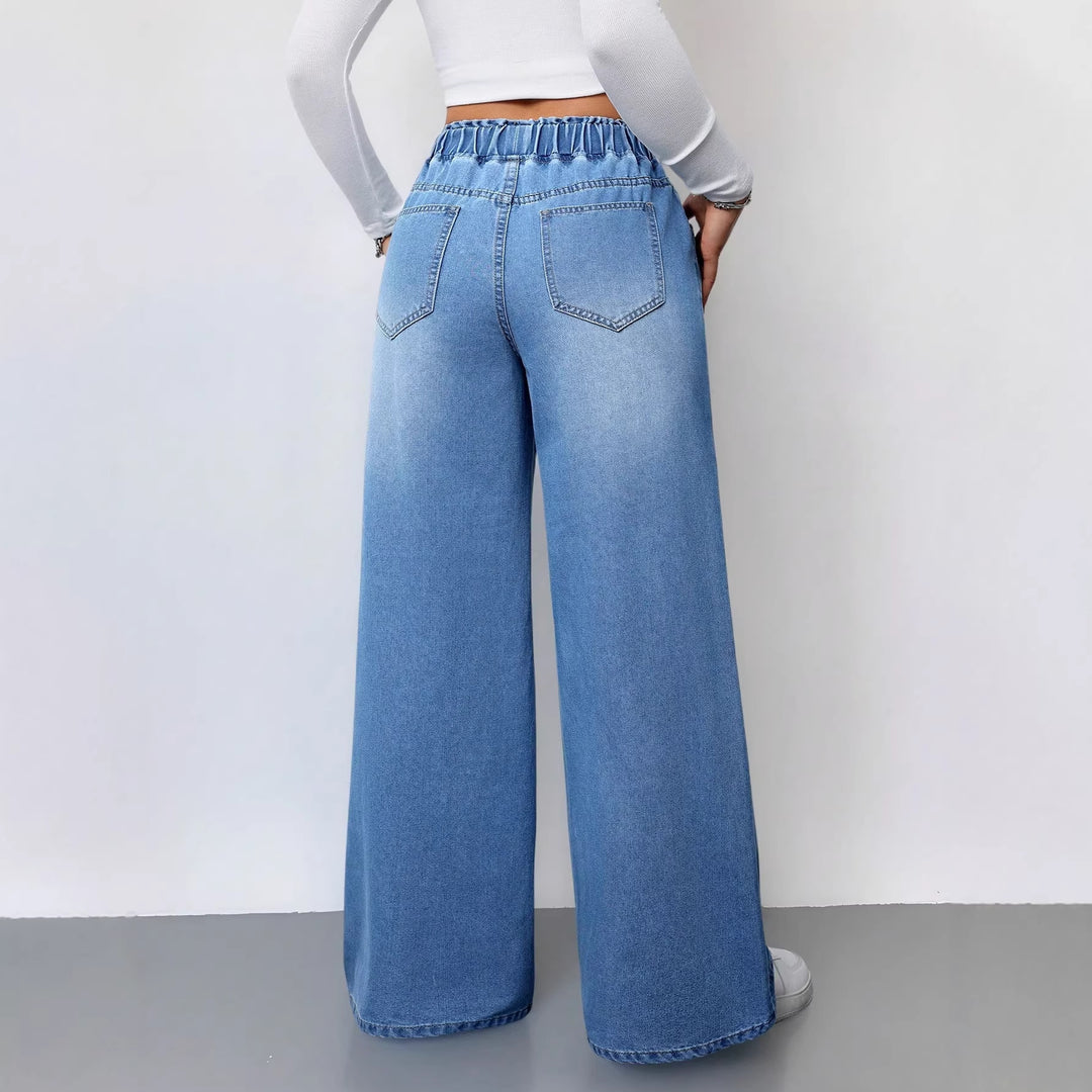 Kvinners vide denimbukser med elastisk midje og praktiske lommer