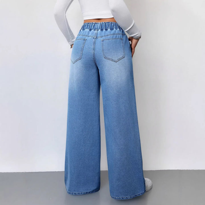 Kvinners vide denimbukser med elastisk midje og praktiske lommer