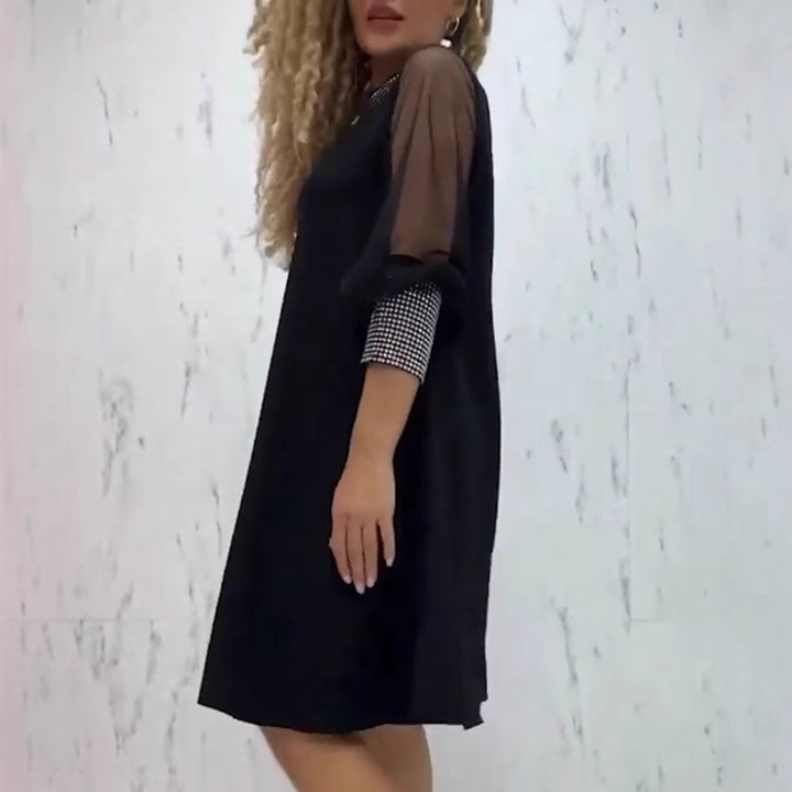 Kjole for damer med transparente ermer og glitrende detaljer Skjora