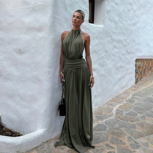 Kvinne elegant max kjole med høykvalitets halterneck design og flytende stoff