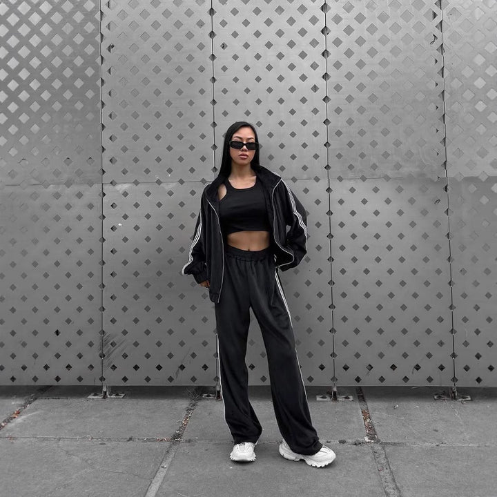 Dame sporty velour joggedress med sidestriper Skjora