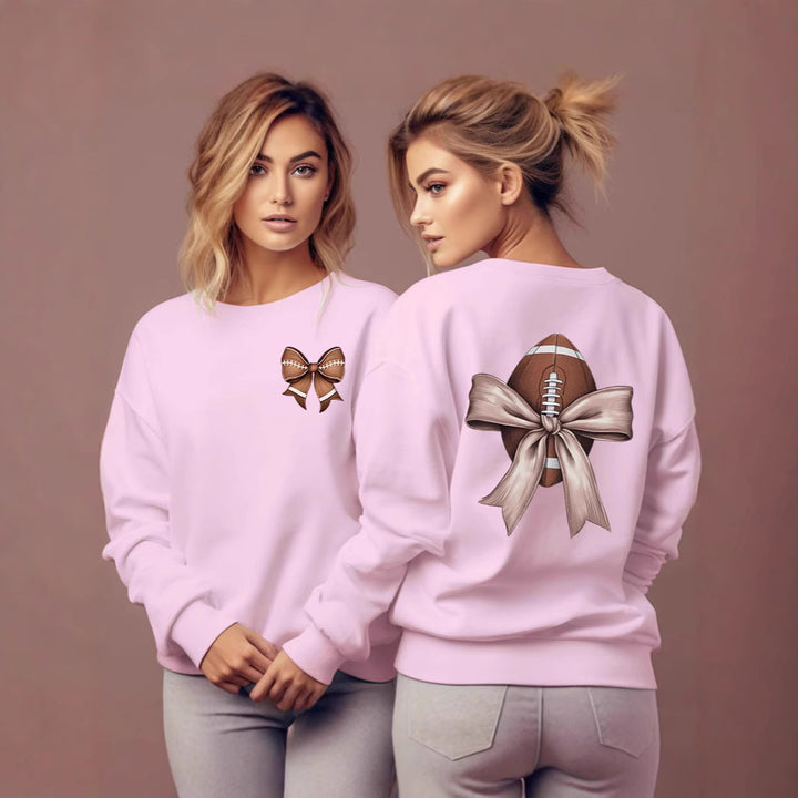 Dame sweatshirt med søtt fotballmotiv og sløyfeakcent Skjora