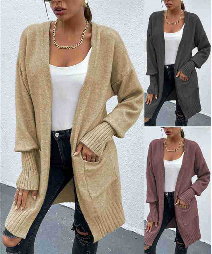 Kvinnens chunky strikk cardigan med dype lommer og avslappet design Skjora