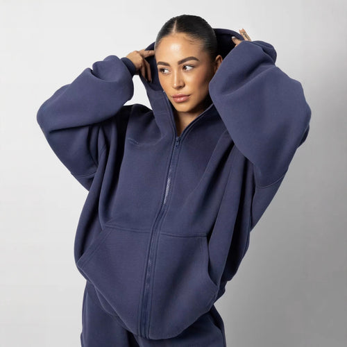Kvinnelig sporty fleece-drakt med høy krage og praktiske lommer Skjora