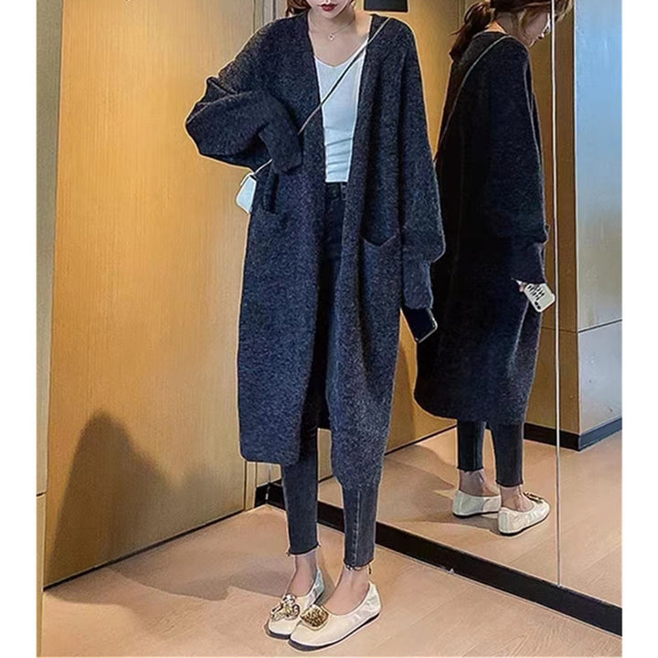 Dame oversized strikket jakke med lommer og avslappet passform Skjora