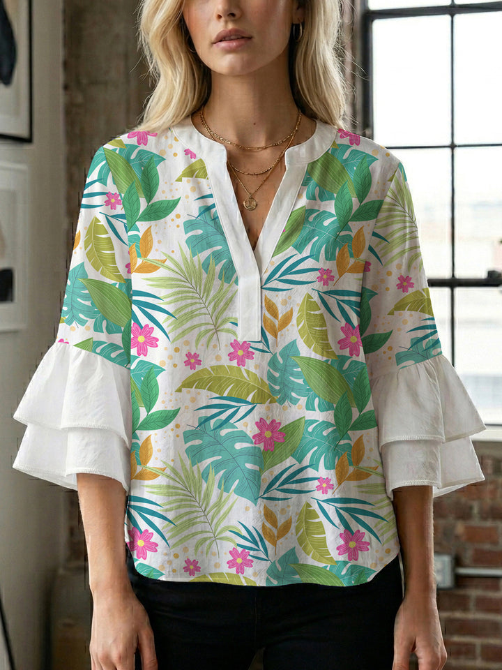 Dame bluse med voluminøse rysjermer og moderne motiv Skjora