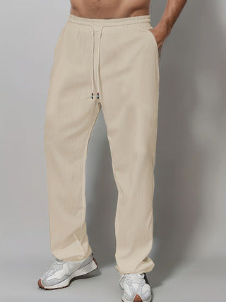Herre Sporty Avslappet Passform Joggebukser med Elastisk Liv og Sidelommer Skjora