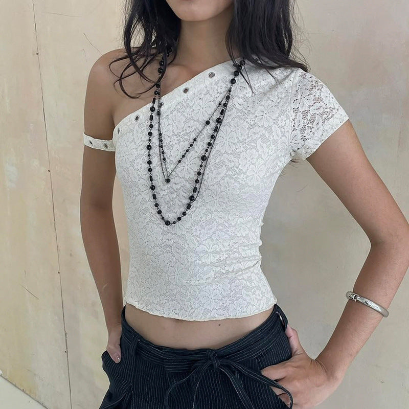Damer elegant topp laget av delikat spiss med kort erme og spennende design Skjora