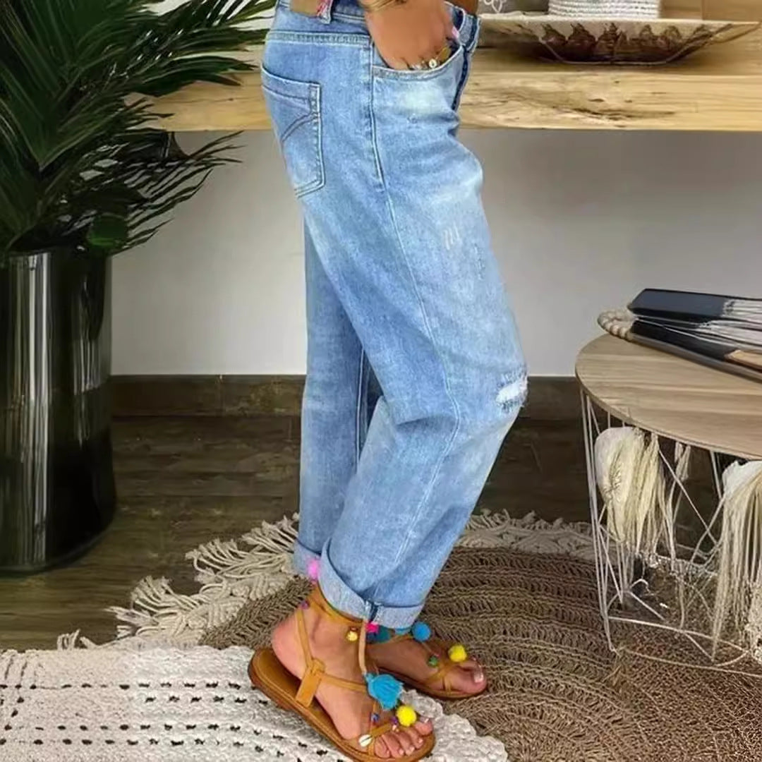 Kvinne Mom Jeans med knappelukking og stilige slitte detaljer