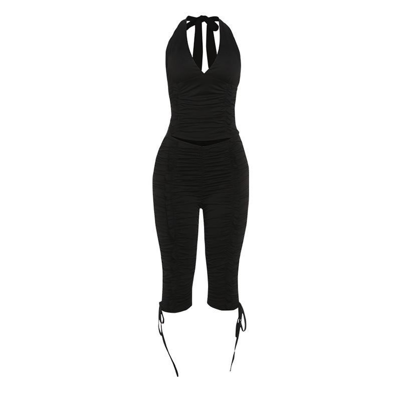 Dame jumpsuit med raffinerte rynkeelementer og stilige bånd