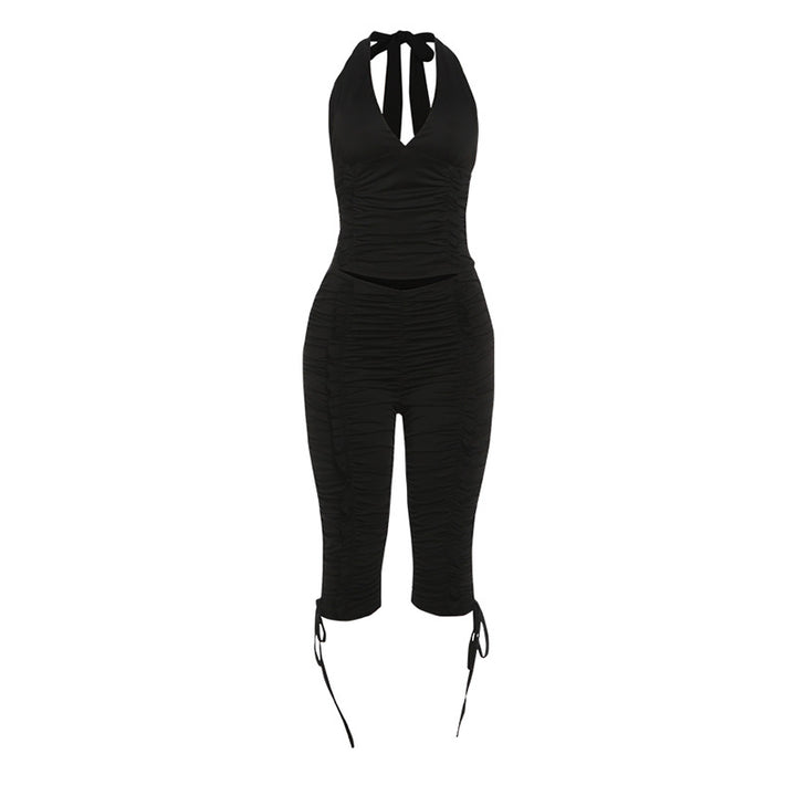 Dame jumpsuit med raffinerte rynkeelementer og stilige bånd