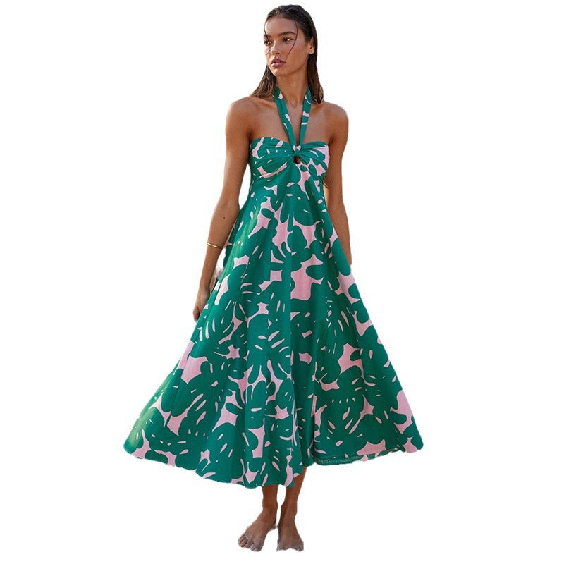 Kvinne maxi kjole med blomster bandeau design og elegant utsvingt skjørt