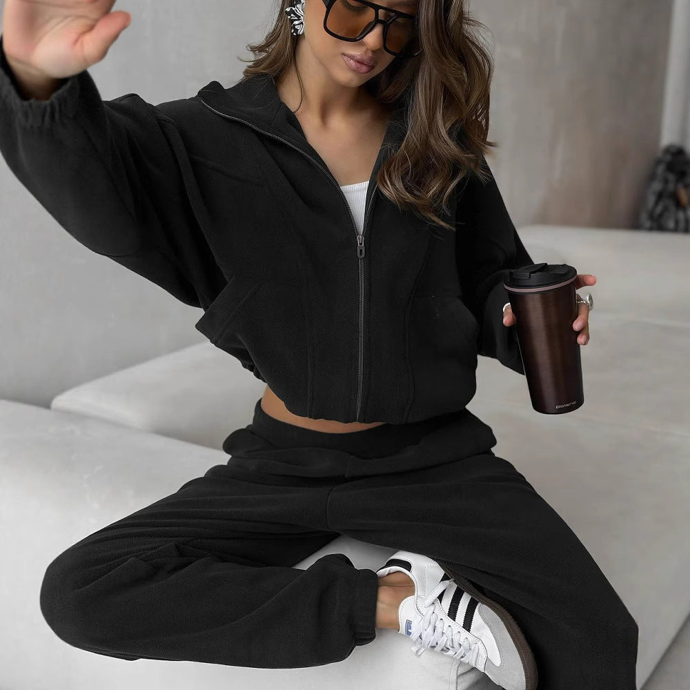 Kvinnelig sporty fleece treningsoverall med hette og lommer Skjora