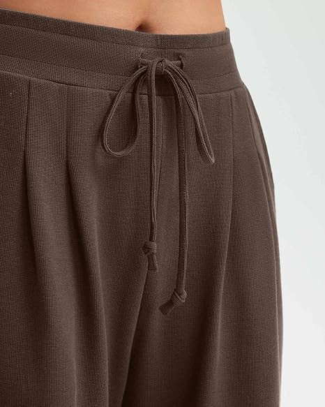 Uformelle baggy bukser for kvinner med knappdetaljer Skjora