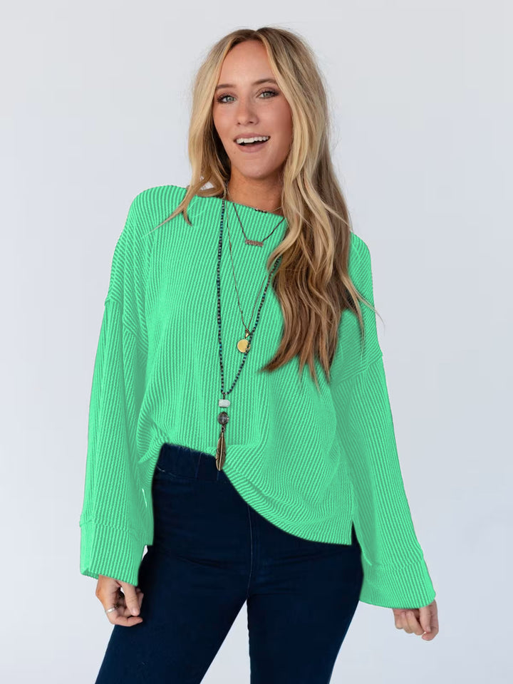 Topp for kvinner i casual stil med strukturert ribbestrikket mønster og brede vide ermer Skjora