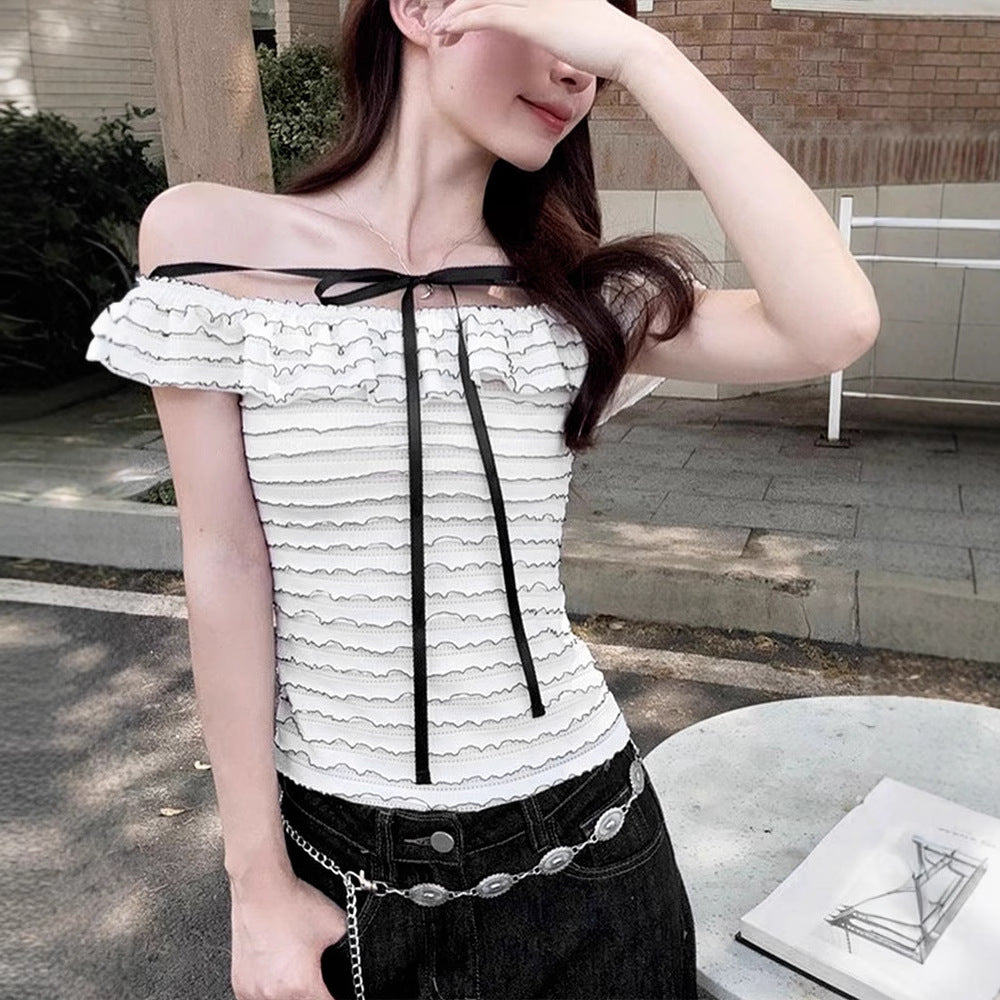 Dame Offshoulder-bluse med elegant bølgemønster Skjora