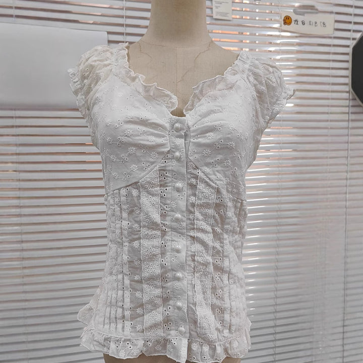 Damebluse med romantisk volangdesign og dekorative knappe detaljer Skjora