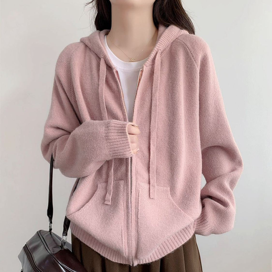 Damenes oversized hettegenser med kort snitt og praktiske lommer Skjora