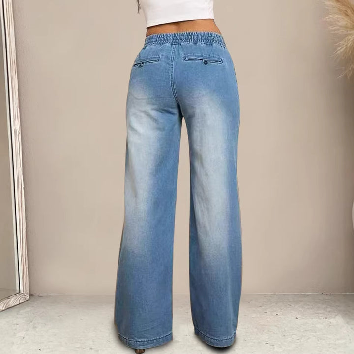Kvinners vidde jeans med elastisk midje og trendy brukt utseende