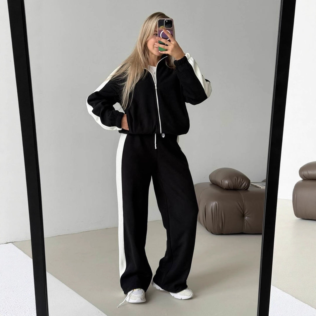 Kvinnes sporty fleece treningsoverall med høy krage og sidestriper Skjora