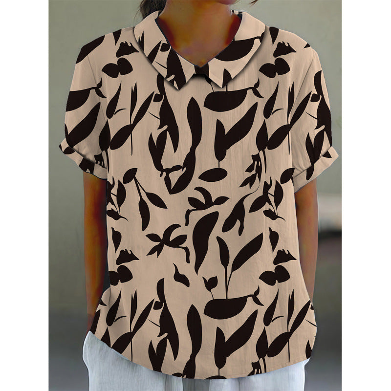 Dame kortermet bluse med florale accenter og klassisk krage Skjora