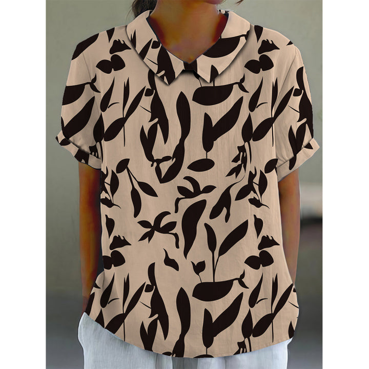 Dame kortermet bluse med florale accenter og klassisk krage Skjora