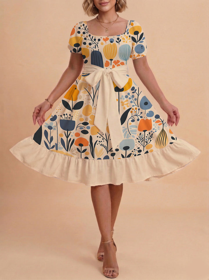 Dame Midi kjole med elegant blomstertrykk og belte i midjen Skjora