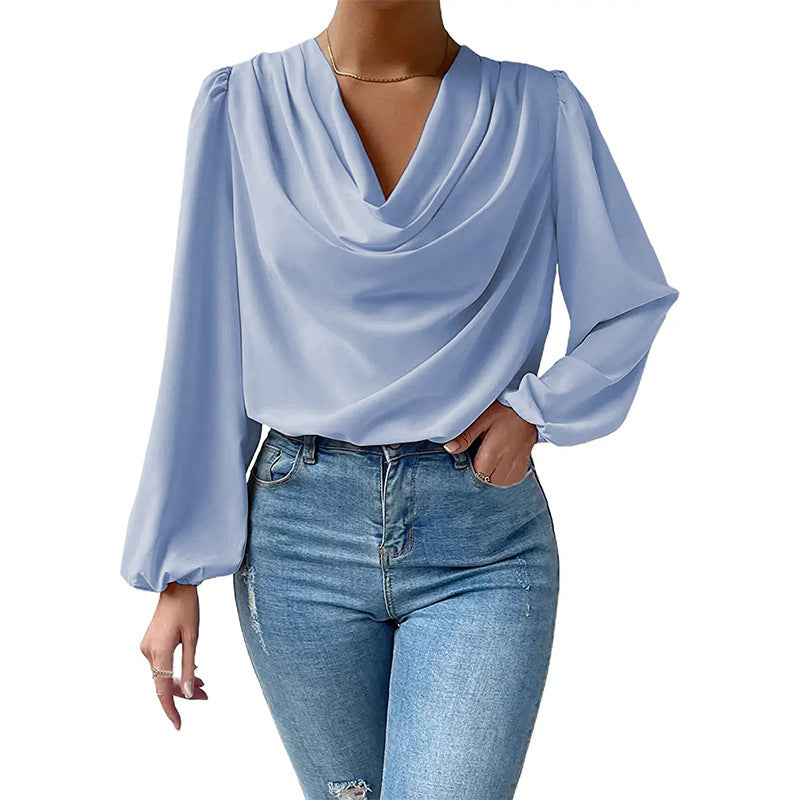 Damer Elegant Langarm-bluse med drapering og vid passform Skjora