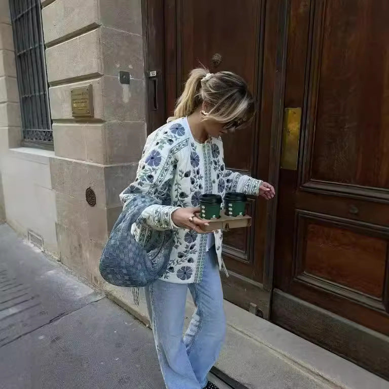 Dame blusejakke med blomstermønster og justerbart belte Skjora