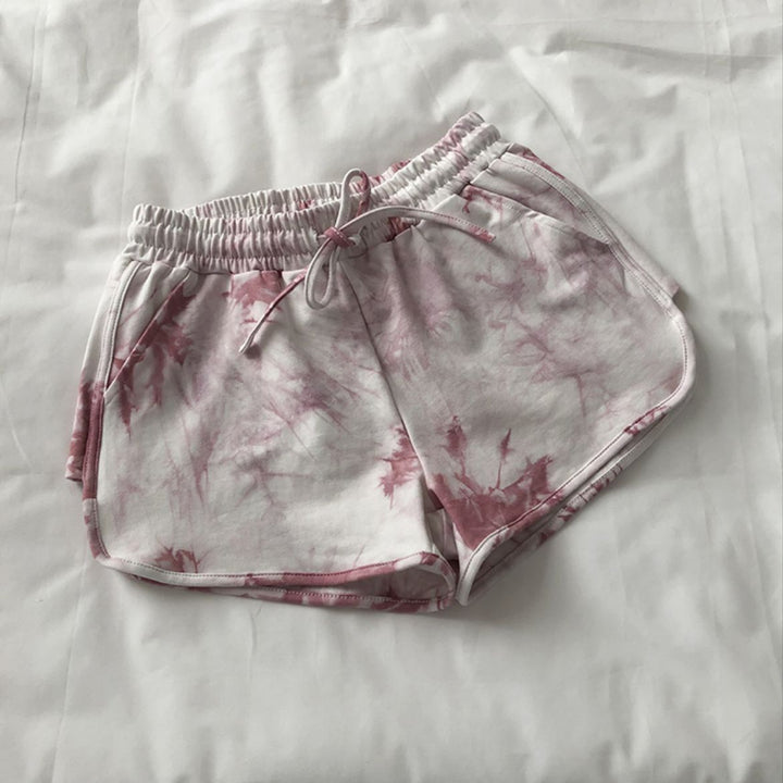 Kvinne casual sweatshorts med trendy tie-dye design og praktiske sidelommer