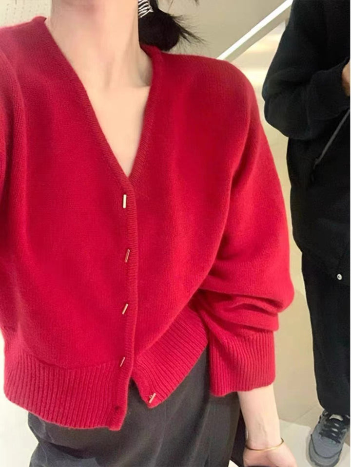 Dame cardigan med dyp V-hals og elegante knapper Skjora