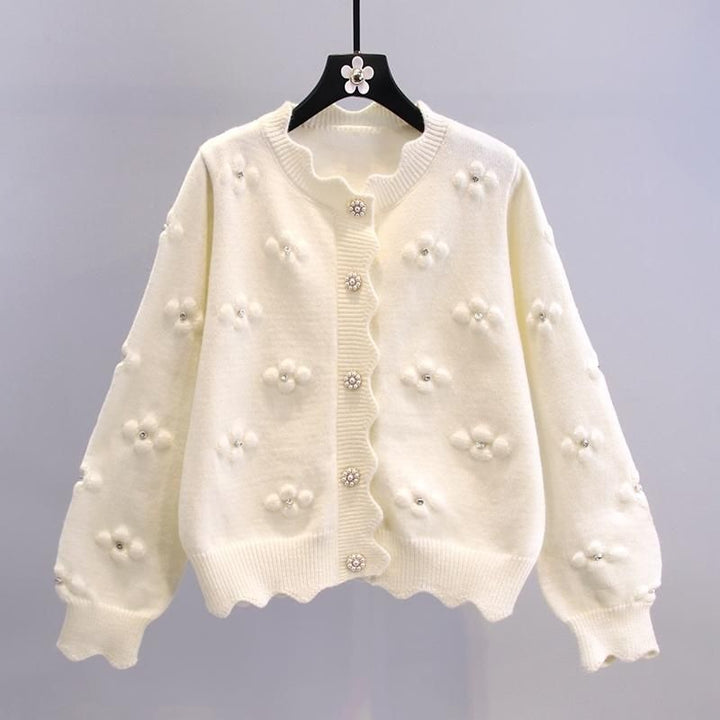 Kvinnenes koselige cardigan med blomsterapplikasjoner Skjora