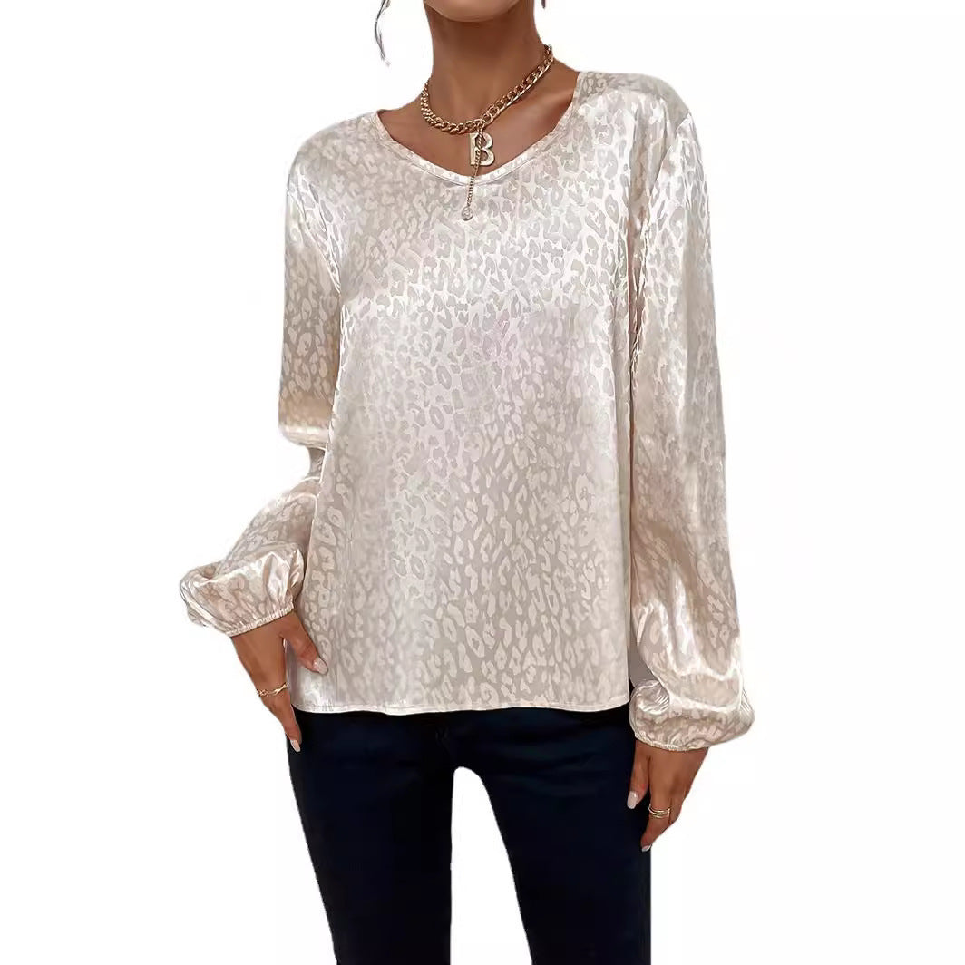 Kvinnes elegant bluse topp med v-hals og voluminøse ermer Skjora