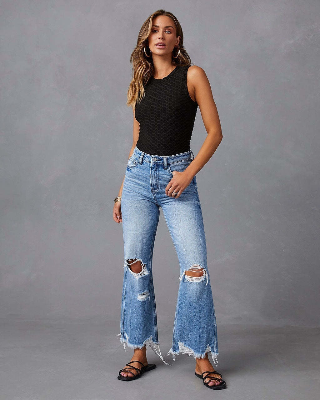 Dame Flared Jeans med stilige rift detaljer og frynsete hem Skjora