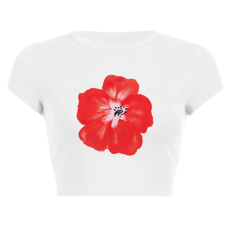 Damer ermeløs topp med blomsterlig hibiskus-motiv Skjora
