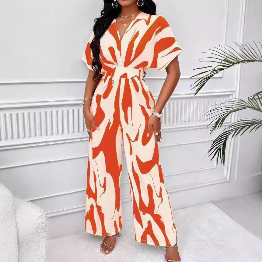 Dame Elegant Jumpsuit med stort mønster og V-hals Skjora