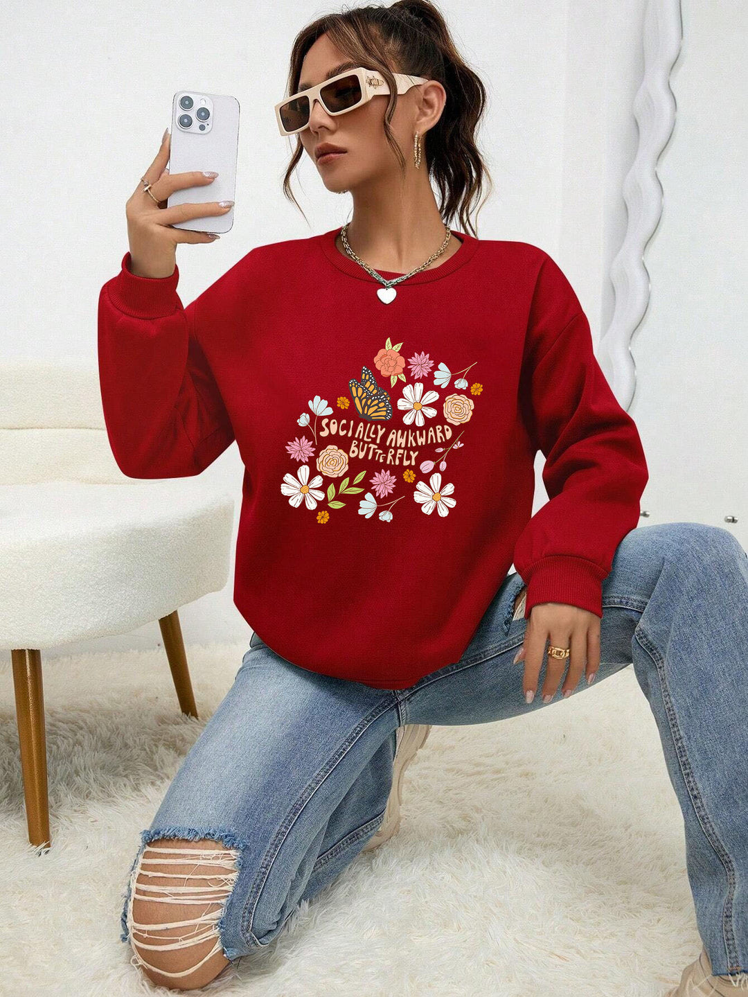 Kvinne sweatshirt med kreativt blomsterdesign og inspirerende trykk Skjora