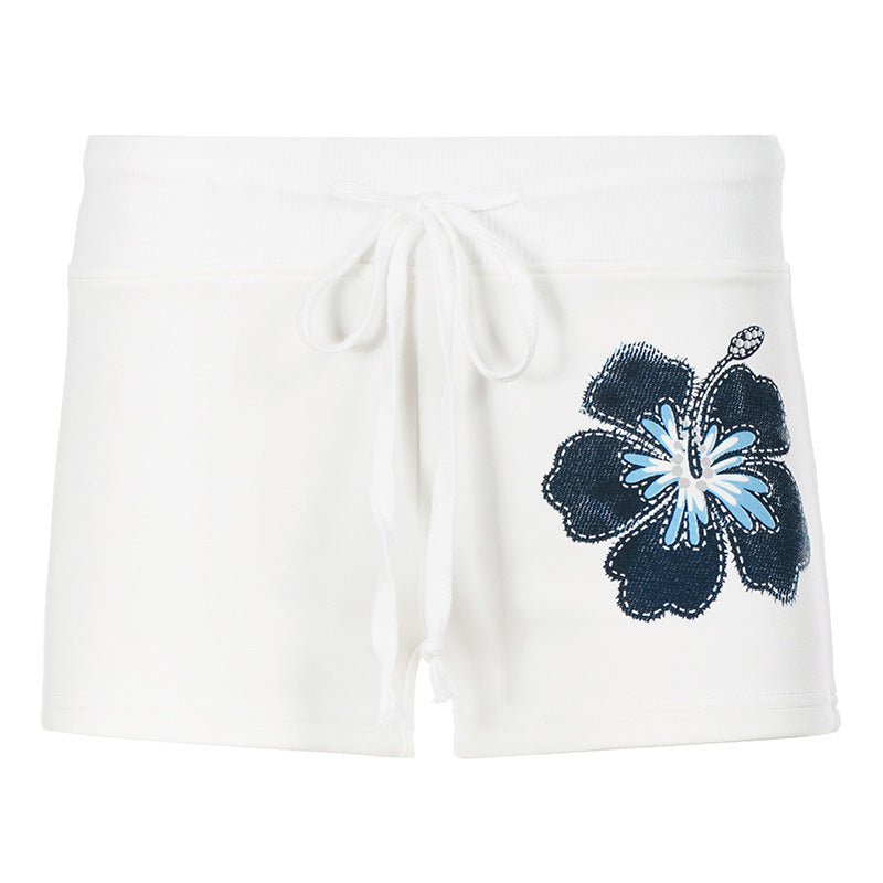 Dame sportsshorts med blomsterdesign og elastisk midjebånd Skjora