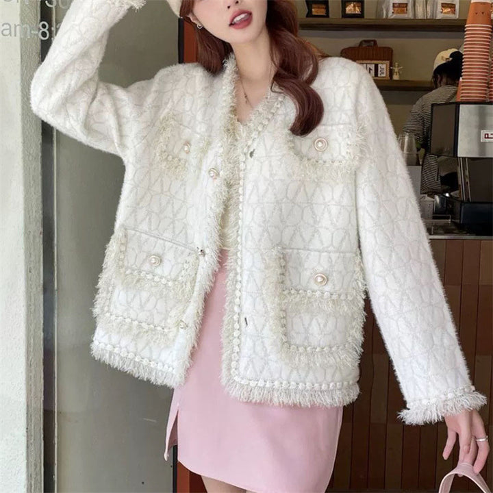 Kvinne Fluffy Cardigan med elegante knappdetaljer og dekorativ kant Skjora