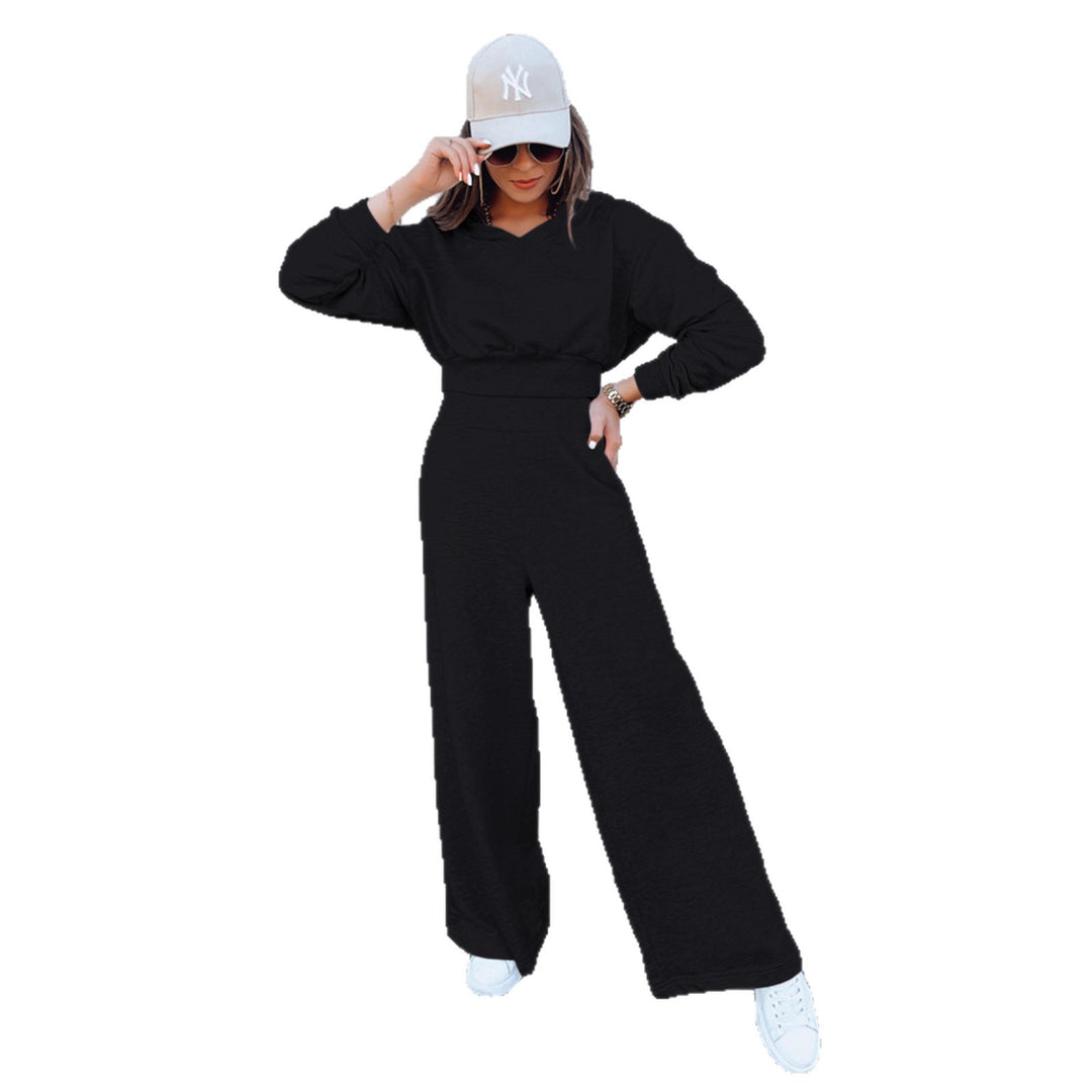 Kvinne casual jumpsuit med vide ben og praktisk hette Skjora