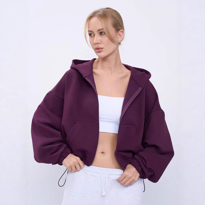 Kvinnenes cropped hettejakke med voluminøse ermer og praktiske lommer Skjora