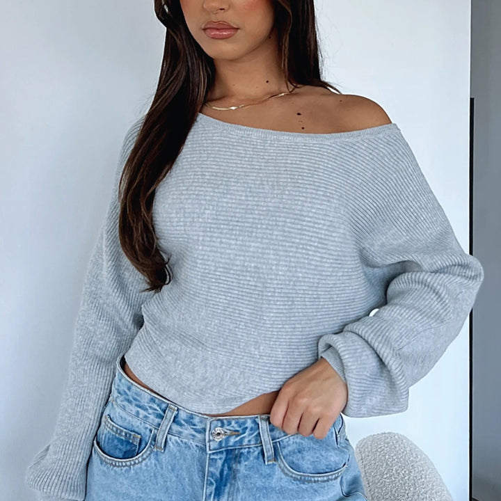 Kvinnens uformelle crop genser med asymmetrisk hals og ribbet tekstur Skjora