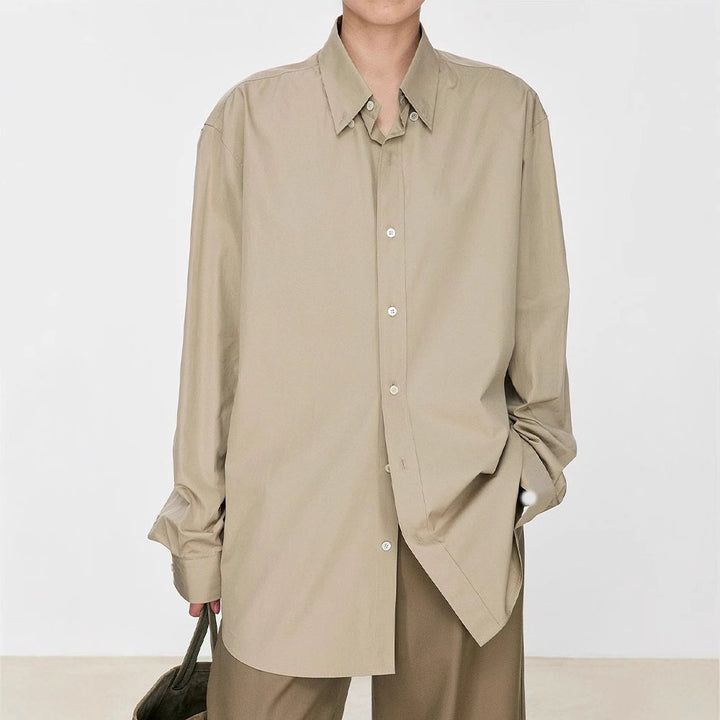 Damer elegant oversized bluse med klassiske knappedetaljer Skjora