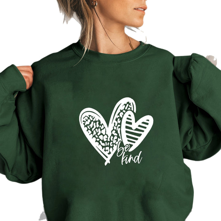Kvinne sweatshirt med moderne hjerte motiv og avslappet passform Skjora