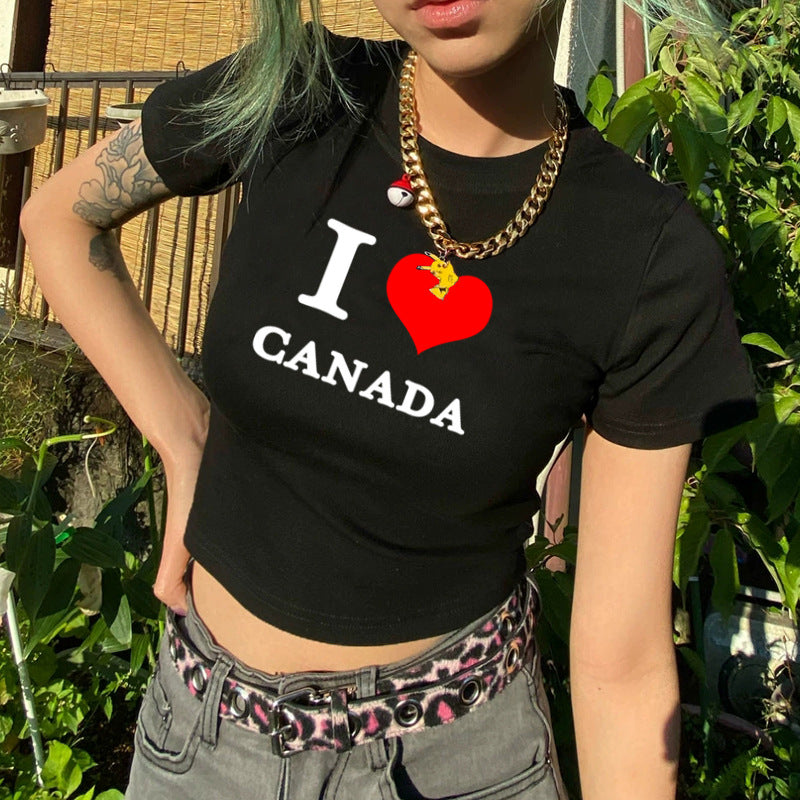 Dame cropped T-shirt med kreativt trykk og komfortabel rund halsutskjæring Skjora