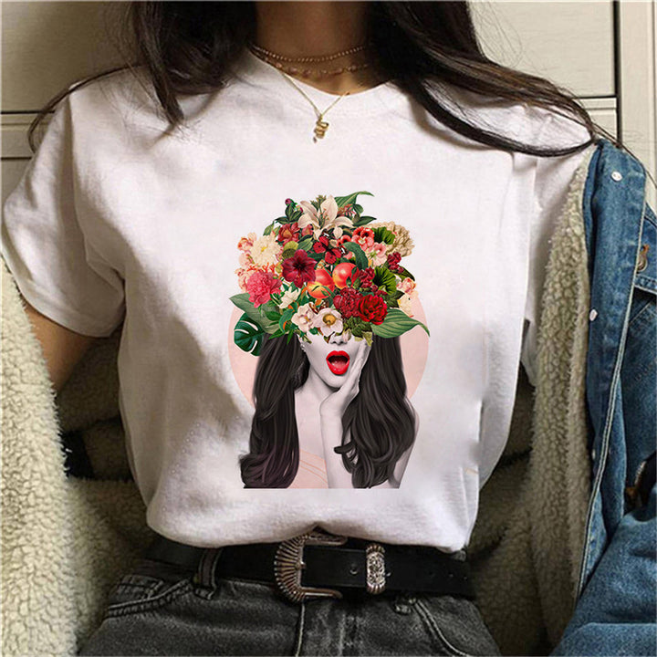 Dame T-skjorte med blomstertrykk og kreativt kunstmotiv Skjora