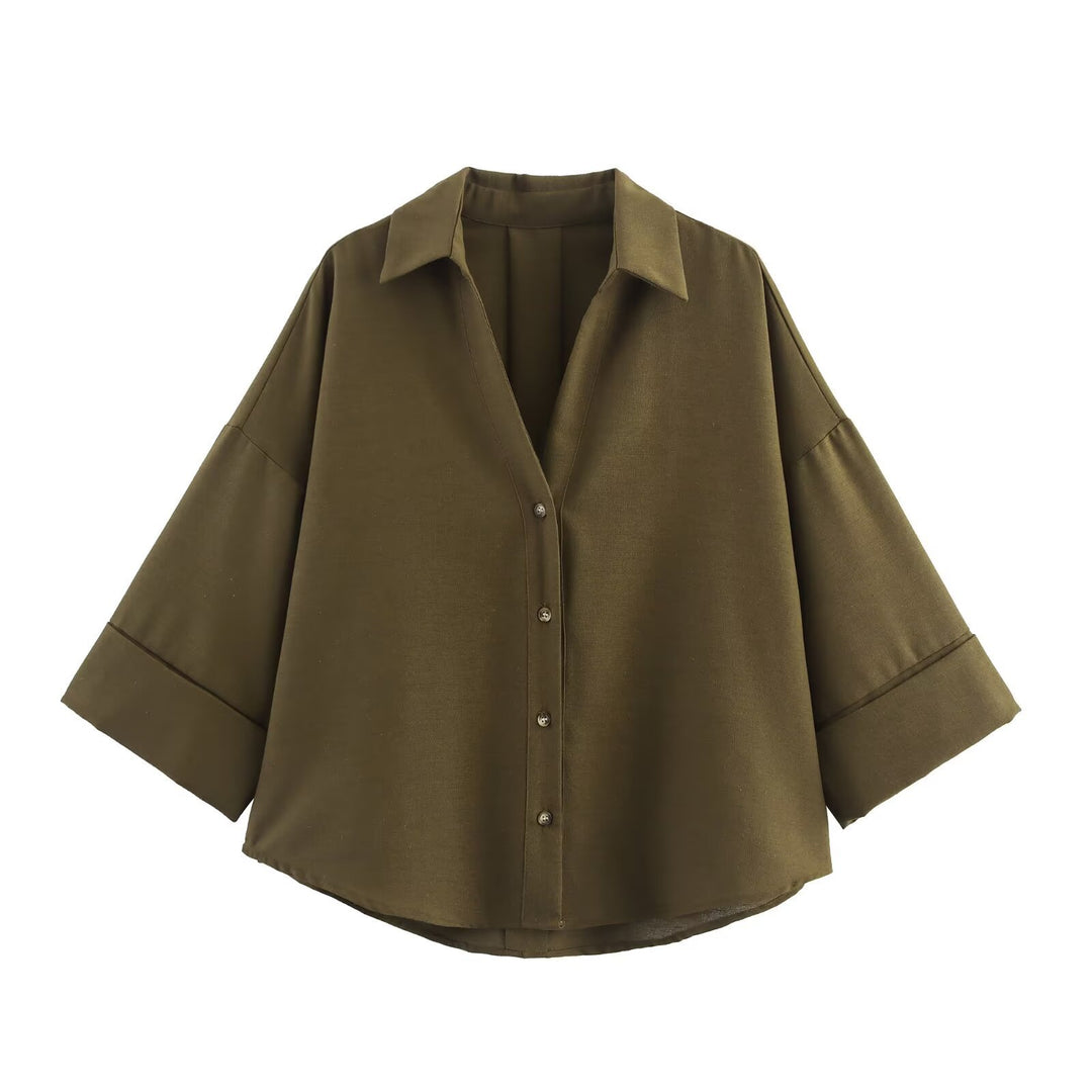 Dame skjorte-bluse med avslappet snitt og elegante 3/4-ermer Skjora