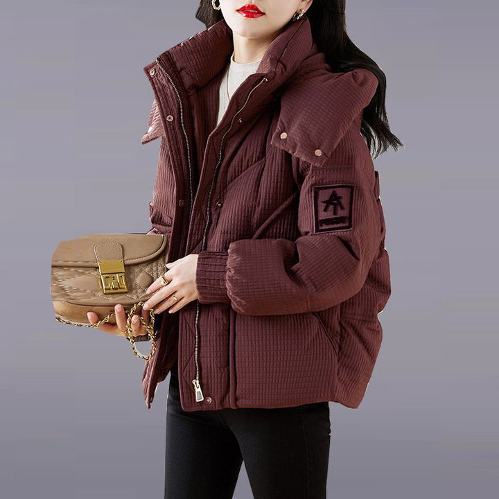 Dames oversized quilted jakke med praktisk hette-design Skjora