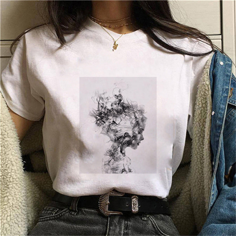 Dame T-skjorte med blomstertrykk og kreativt kunstmotiv Skjora