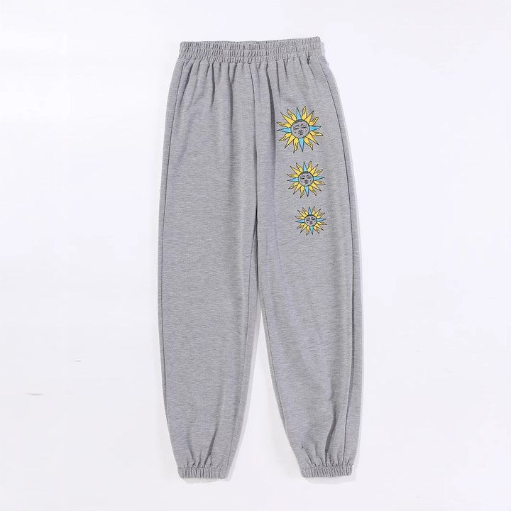 Kvinnenes komfortable joggebukser med trendy solmotiv Skjora